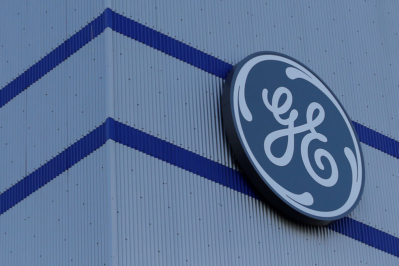 © Reuters. FILE PHOTO: The General Electric logo is pictured on the General Electric offshore wind turbine plant in Montoir-de-Bretagne