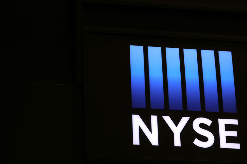 © Reuters. The logo for the NYSE is displayed on the trading floor in New York