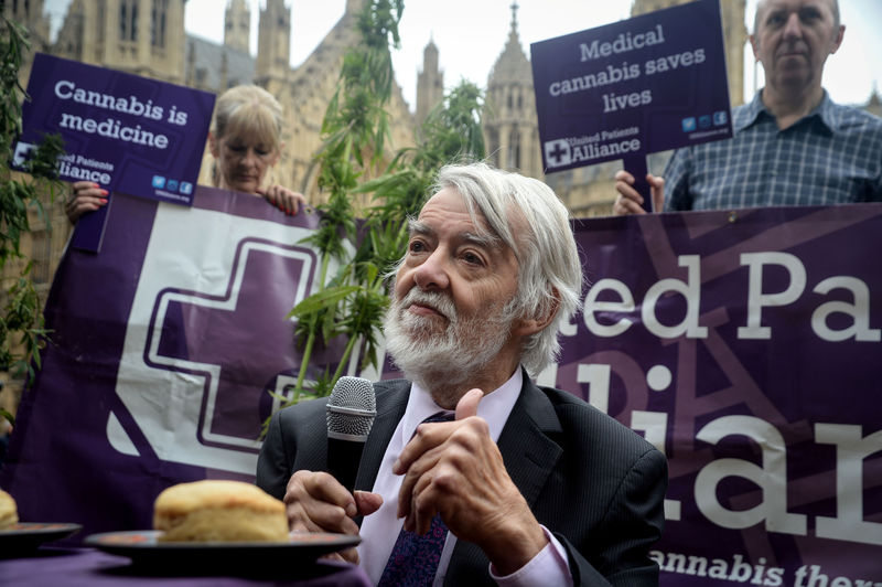 © Reuters. FILE PHOTO: Member of Parliament Paul Flynn speaks at a legalise cannabis tea party outside the Houses of Parliament, in London