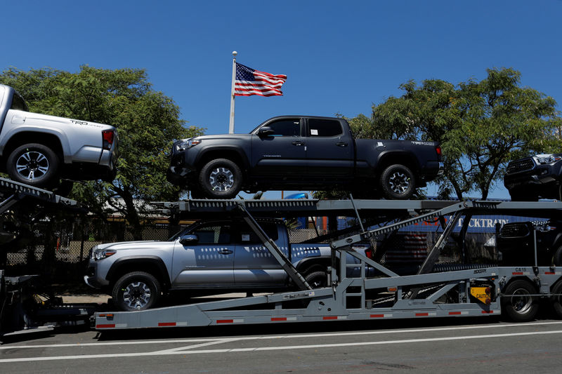 © Reuters. FILE PHOTO:  Toyota trucks are shown on a car carrier for delivery after arriving in the United States in National City, California