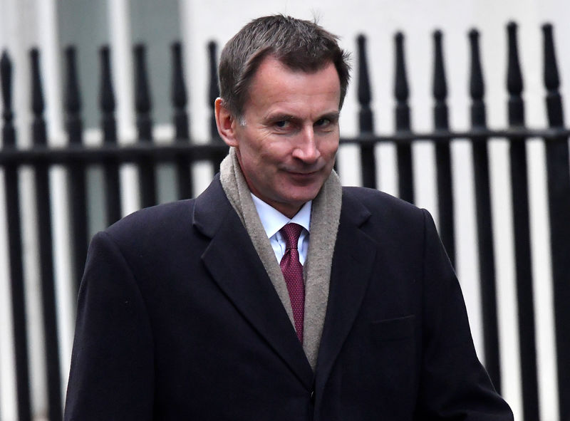 © Reuters. Britain's Foreign Secretary Jeremy Hunt walks in Downing Steet in London