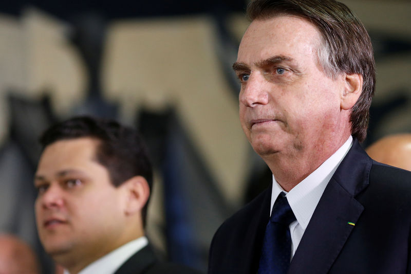 © Reuters. Brazil's President Bolsonaro arrives for a meeting to deliver the  pension reform bill proposal at the National Congress, in Brasilia