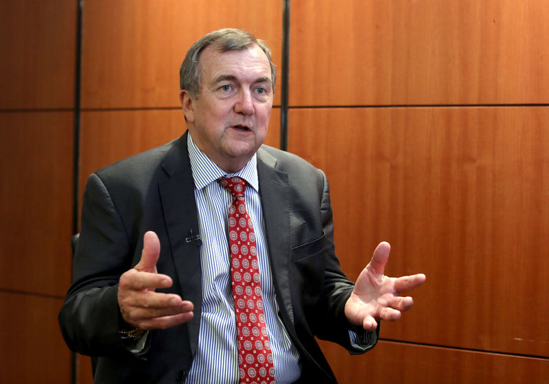 © Reuters. Mark Bristow, chief executive officer of Barrick Gold, speaks during an interview at the Investing in African Mining Indaba conference in Cape Town
