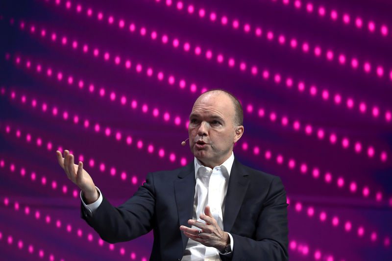 © Reuters. Nick Read, CEO of Vodafone, gestures as he speaks during the Mobile World Congress in Barcelona