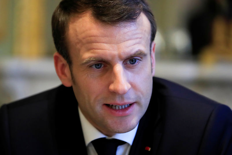 © Reuters. IL N'Y A PAS DE PROGRAMME DE RETOUR DES DJIHADISTES FRANÇAIS, SELON MACRON