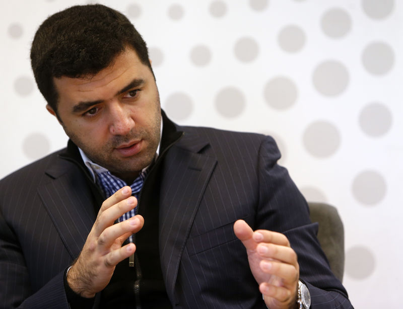 © Reuters. Первый замглавы Русгидро Джордж Рижинашвили на инвестиционном саммите Рейтер в Москве