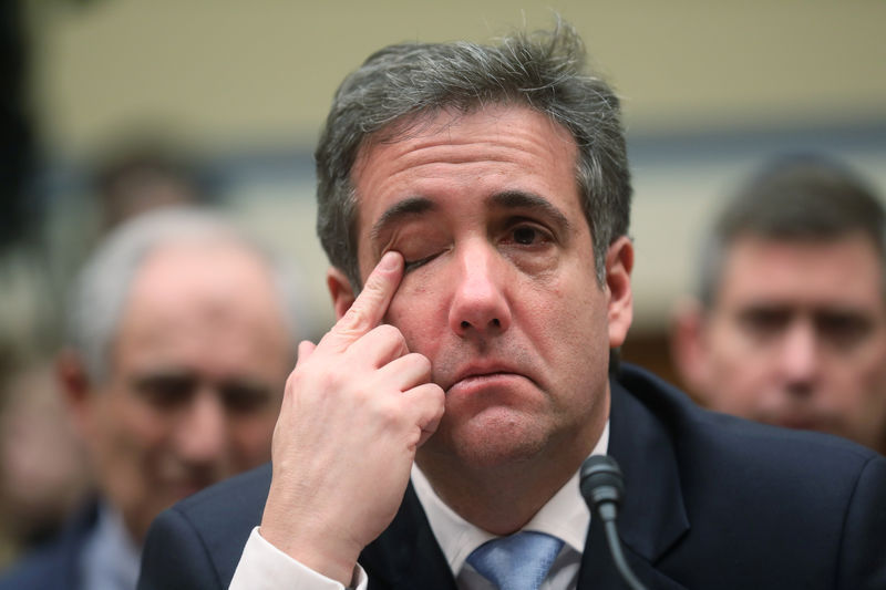 © Reuters. Former Trump personal attorney Michael Cohen becomes emotional at House Oversight hearing in Washington