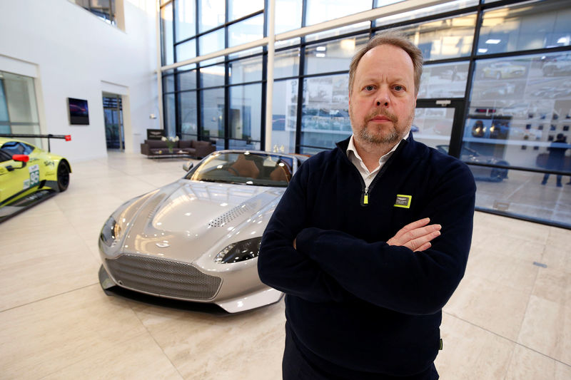 © Reuters. Andy Palmer, CEO of Aston Martin poses for a photograph at their world headquarters in Gaydon