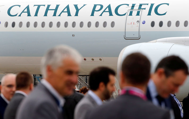 © Reuters. FILE PHOTO: A passenger plane of Cathay Pacific Airways parks at the airport in Colomiers near Toulouse, France