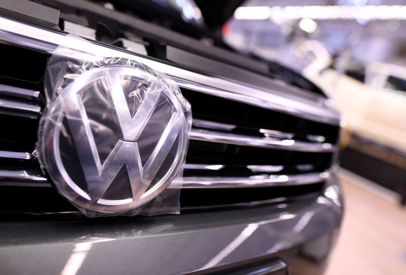 © Reuters. A Volkswagen logo is pictured in a production line at the Volkswagen plant in Wolfsburg