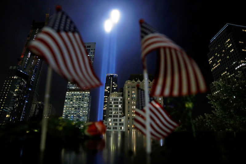 © Reuters. FILE PHOTO: The Tribute in Light installation is illuminated over lower Manhattan as seen from The National September 11 Memorial & Museum marking the 17th anniversary of the 9/11 attacks in New York