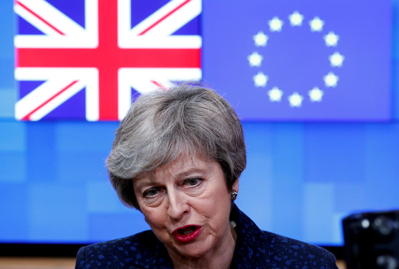 © Reuters. FILE PHOTO: British PM May speaks at the European Council headquarters in Brussels