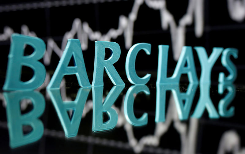 © Reuters. FILE PHOTO: The Barclays logo is seen in front of displayed stock graph in this illustration