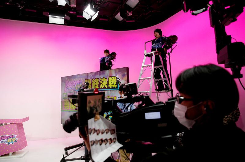 © Reuters. AbemaTV's staffs prepare for filming at its studio in Tokyo