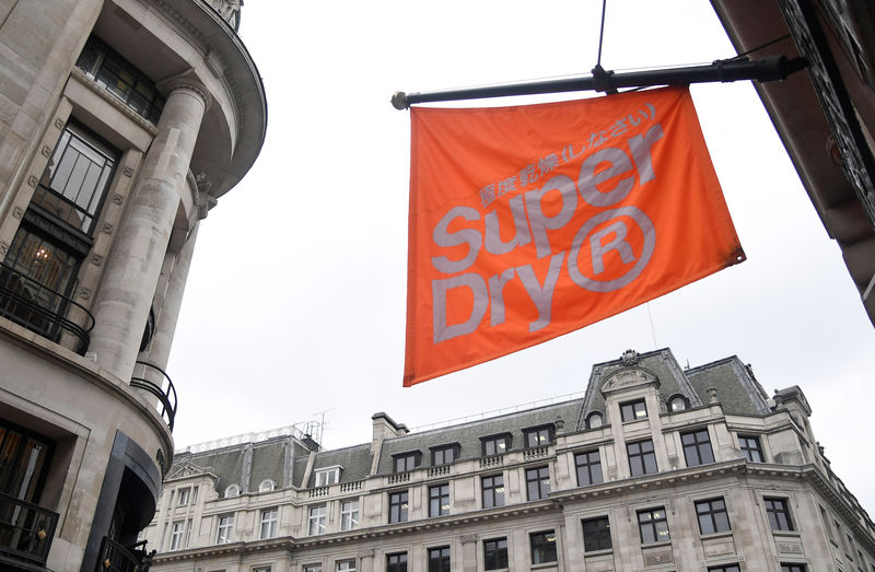 © Reuters. Signage is seen at a Superdry store in London