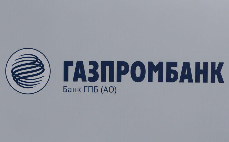 © Reuters. FILE PHOTO: The logo of Gazprombank is seen on a board at the SPIEF 2017 in St. Petersburg