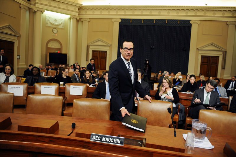 © Reuters. FILE PHOTO: U.S. Treasury Secretary Steven Mnuchin testifies at U.S. House Ways and Means Committee hearing