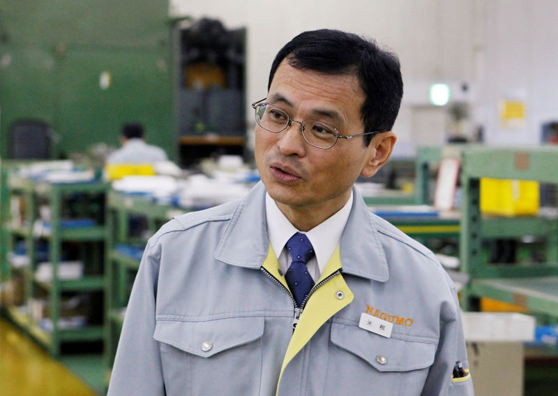 © Reuters. Nagumo Seisakusho Co., Ltd. President Hiroshi Komemasu speaks during an interview with Reuters at his factory in Jyoetsu