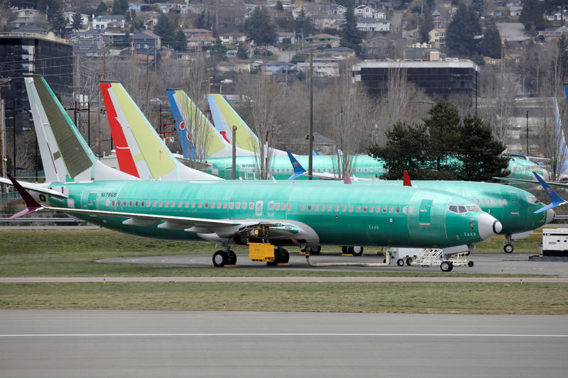 © Reuters. FILE PHOTO: Boeing 737 MAX aircraft are parked at a Boeing production facility in Renton