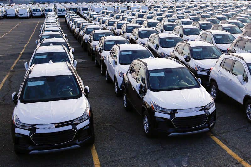 © Reuters. FILE PHOTO: Imported automobiles are parked in a lot at the port of Newark New Jersey