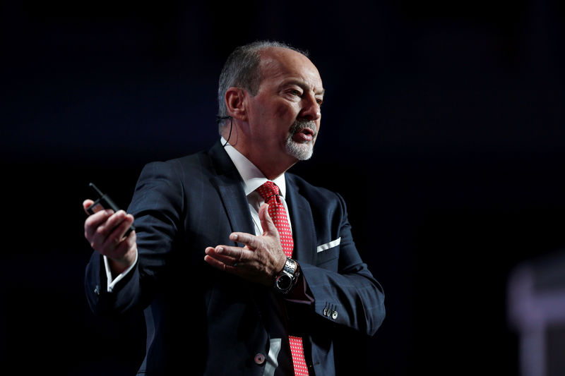 © Reuters. FILE PHOTO: Peter Moore, CEO of Liverpool FC gestures during the Dubai International Sports Conference in Dubai