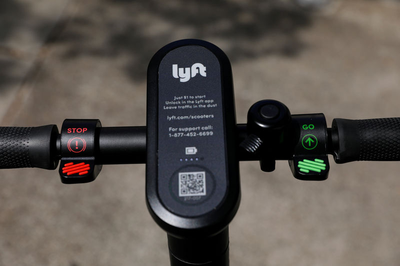© Reuters. FILE PHOTO: An electric scooter from the ride sharing company Lyft is shown on a downtown sidewalk in San Diego