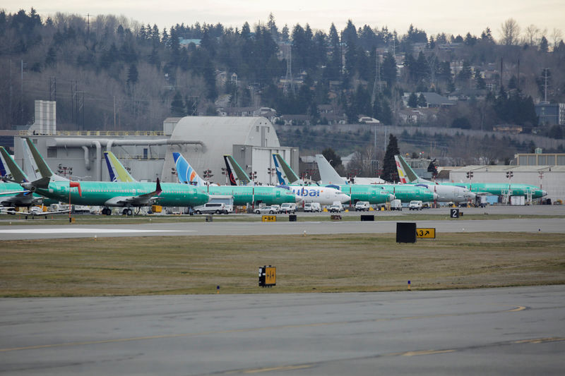 © Reuters. FILE PHOTO: Boeing 737 MAX aircraft are parked at a Boeing production facility in Renton, Washington