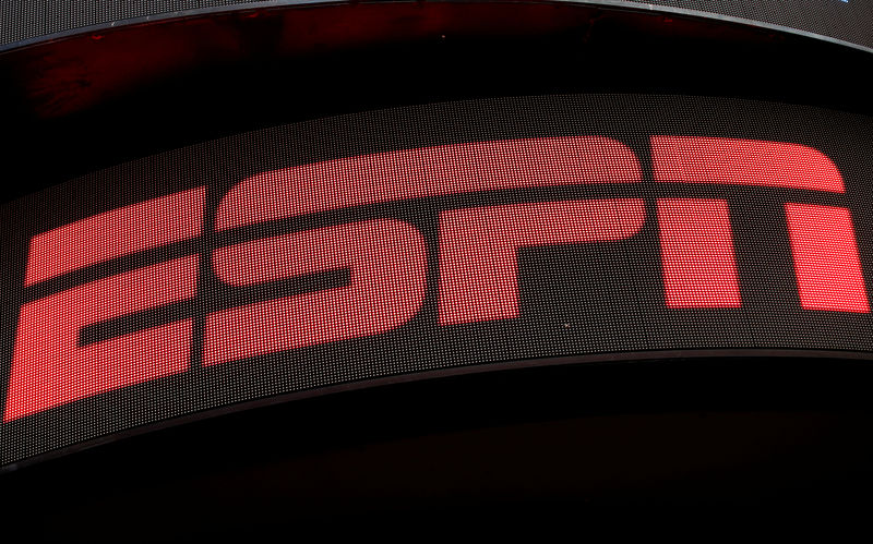 © Reuters. FILE PHOTO: The ESPN logo is seen on an electronic display in Times Square in New York City