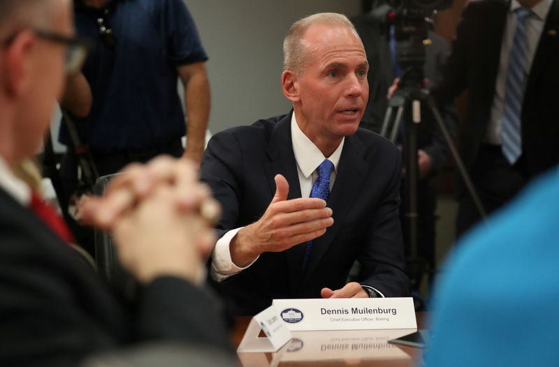 © Reuters. FILE PHOTO: Dennis Muilenburg, CEO, Boeing speaks during a roundtable discussion on defense issues with U.S. President Donald Trump at Luke Air Force Base