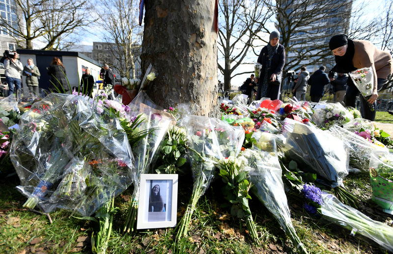 © Reuters. Makeshift memorial at tram shooting site in Utrecht