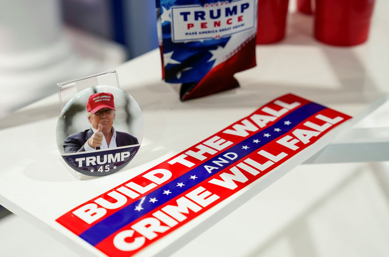 © Reuters. FILE PHOTO: A bumper sticker and pin are for sale at the Trump Victory booth at the Conservative Political Action Conference (CPAC) annual meeting at National Harbor in Oxon Hill, Maryland