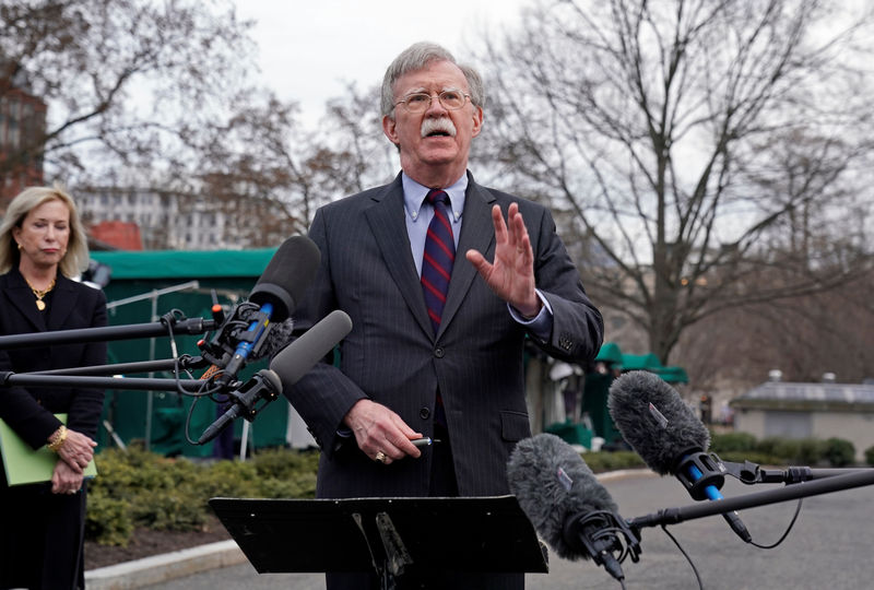© Reuters. FILE PHOTO: John Bolton speaks to reporters at the White House in Washington