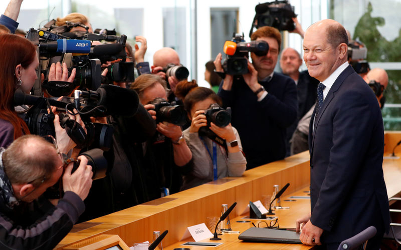 © Reuters. Finance Minister Olaf Scholz addresses a news conference to present the budget plans for 2019 and the upcoming years in Berlin