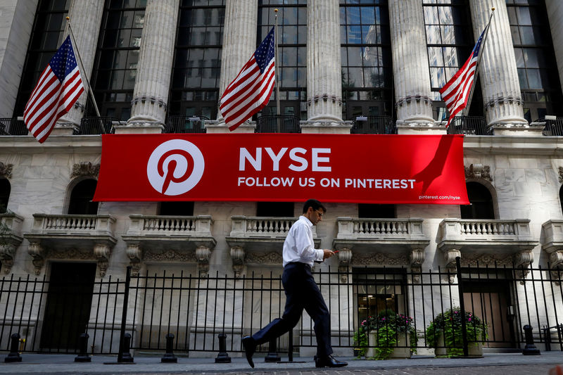 © Reuters. FILE PHOTO:  A Pinterest banner hangs on the facade of the NYSE in New York