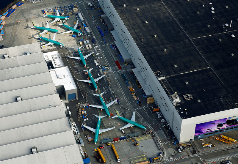 © Reuters. An aerial photo shows Boeing 737 MAX airplanes parked on the tarmac at the Boeing Factory in Renton