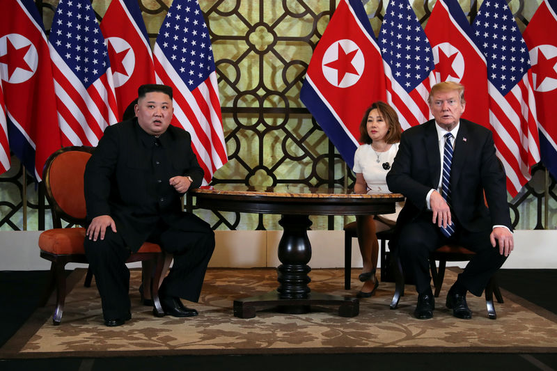 © Reuters. U.S. President Donald Trump and North Korean leader Kim Jong Un listen to questions from the media during the one-on-one bilateral meeting at the second North Korea-U.S. summit in the Metropole hotel in Hanoi