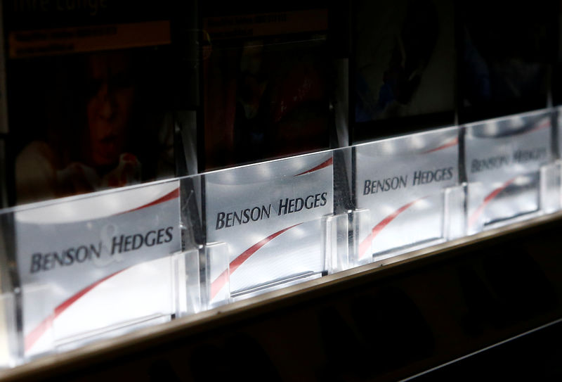 © Reuters. FILE PHOTO:  Packs of Benson & Hedges cigarettes are on display in a tobacco shop in Vienna