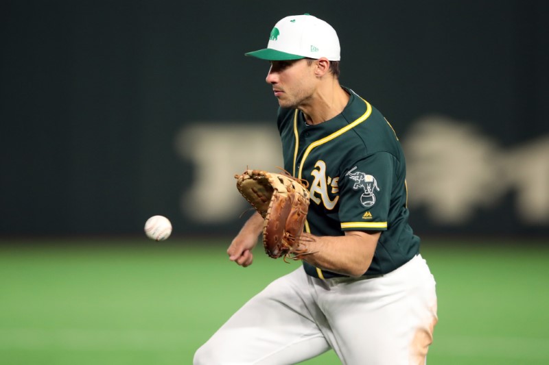 © Reuters. FILE PHOTO: MLB: Spring Training-Oakland Athletics  at Yomiuri Giants