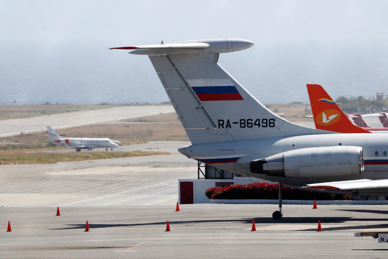 © Reuters. An airplane with the Russian flag is seen at Simon Bolivar International Airport in Caracas