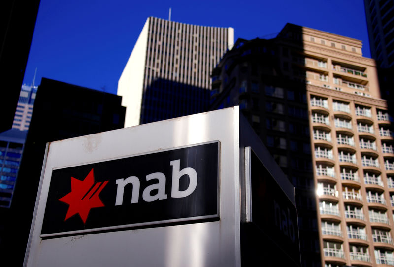 © Reuters. FILE PHOTO: The logo of the National Australia Bank is displayed outside its headquarters building in central Sydney