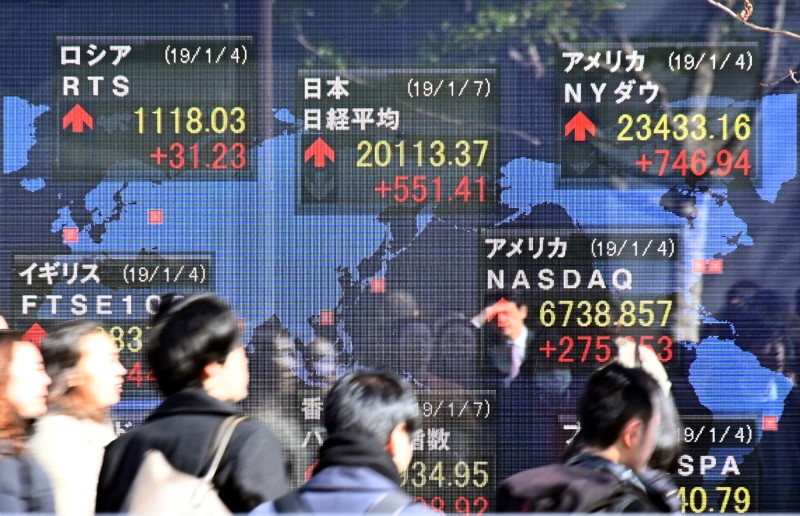© Reuters. Mercado de ações em Tóquio, China