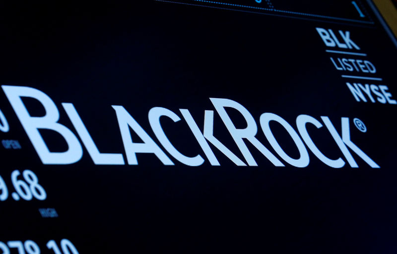 © Reuters. FILE PHOTO: The company logo and trading information for BlackRock is displayed on a screen on the floor of the NYSE