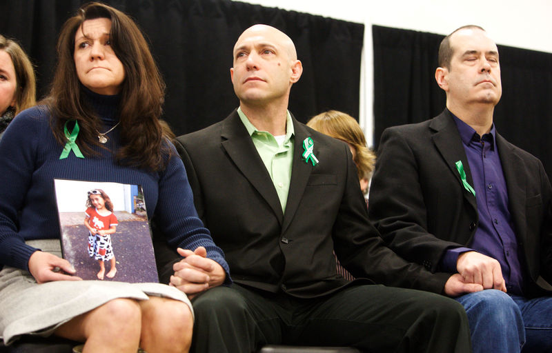 © Reuters. FILE PHOTO: Jennifer Hensel, Jeremy Richman and David Wheeler attend the launch of The Sandy Hook Promise, a non-profit created in response to the shooting in Newtown