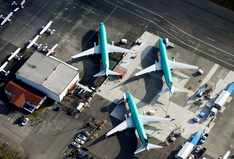 © Reuters. An aerial photo shows Boeing 737 MAX airplanes parked on the tarmac at the Boeing Factory in Renton