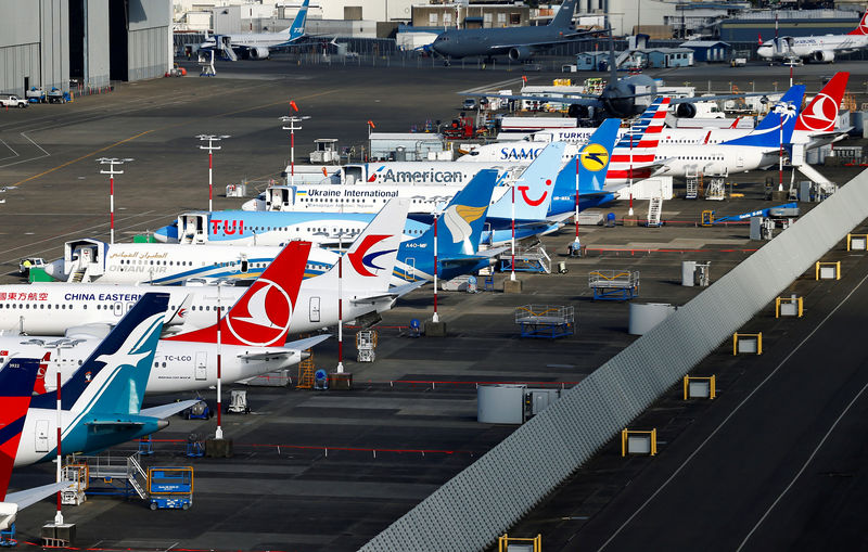© Reuters. An aerial photo shows several Boeing 737 MAX airplanes grounded at Boeing Field in Seattle