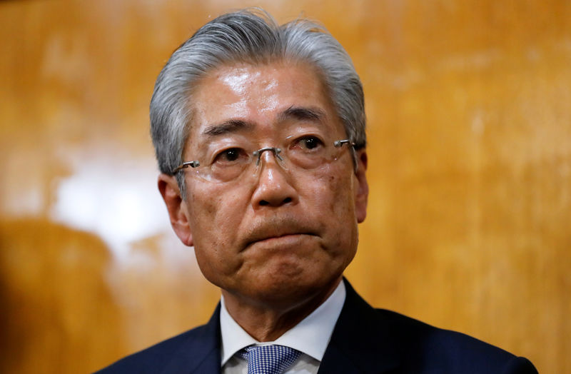 © Reuters. FILE PHOTO: Japanese Olympic Committee President Takeda looks on while addressing media in Tokyo