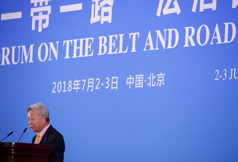 © Reuters. AIIB president Jin Liqun speaks at an international forum on the "Belt and Road" Legal Cooperation in Beijing