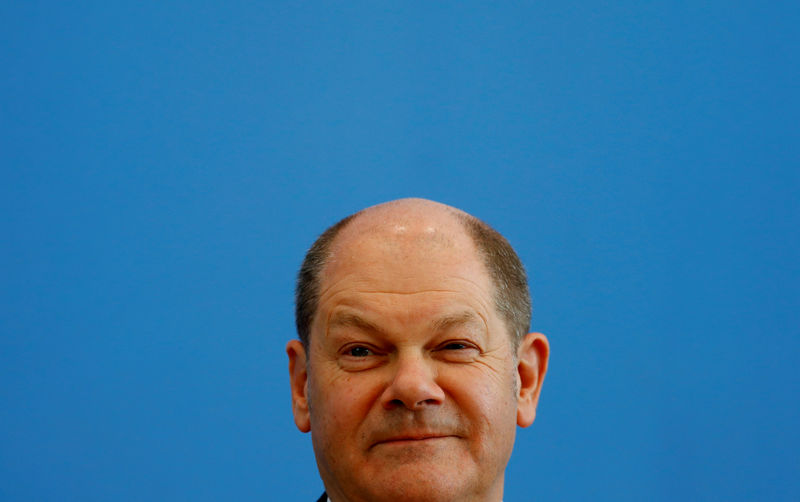 © Reuters. Finance Minister Olaf Scholz addresses a news conference to present the budget plans for 2019 and the upcoming years in Berlin