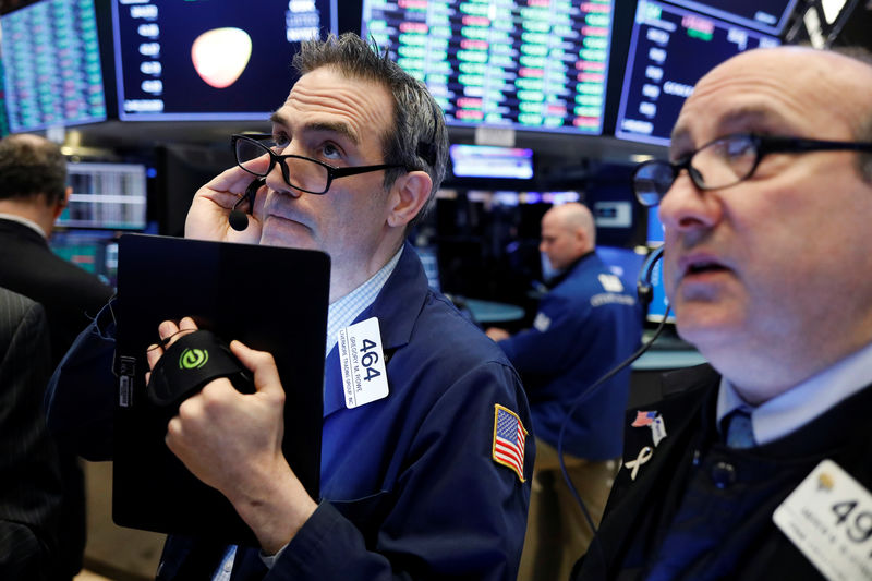 Wall Street ends down as Treasury yields fall on slowdown worries