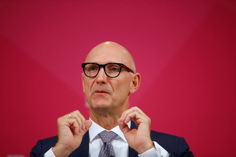 © Reuters. Timotheus Hoettges, CEO of German telecommunications company Deutsche Telekom AG, gestures as he speaks at the company's annual news conference in Bonn